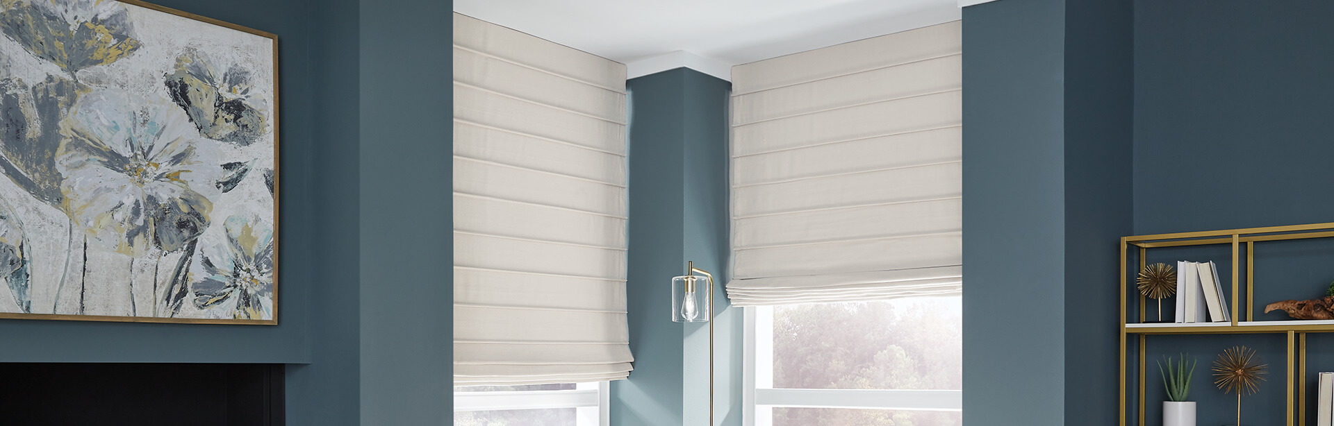 Window-Covering-Safety Neutral colored cordless reverse fold soft shades in a living room with medium blue walls.