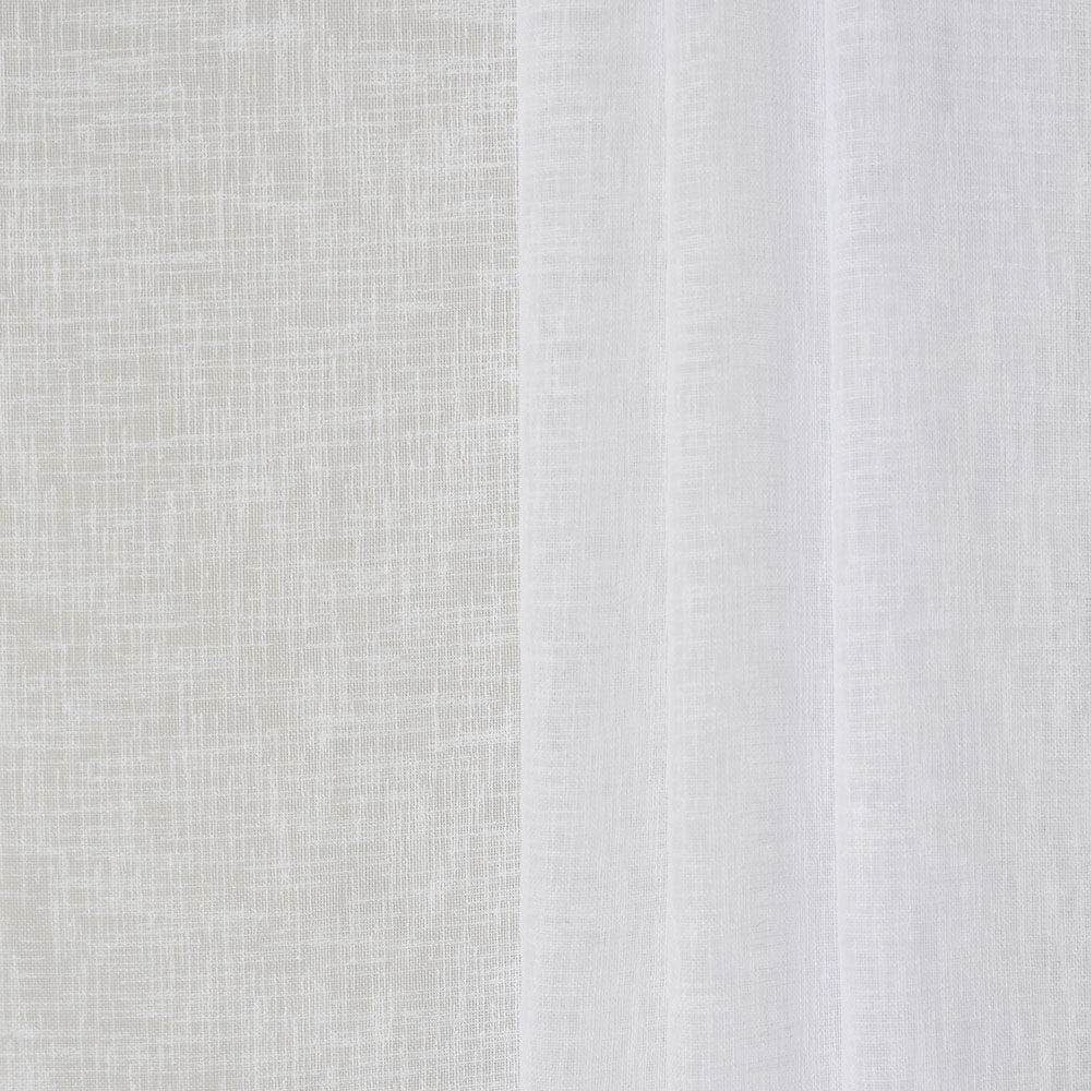 A sheer white fabric with soft folds.