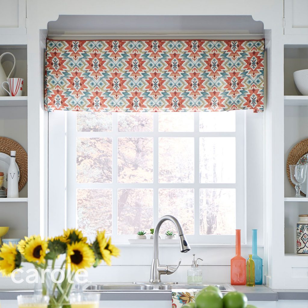 Madison Board Mounted Valance top treatment in a colorful southwestern geometric pattern over a kitchen window.
