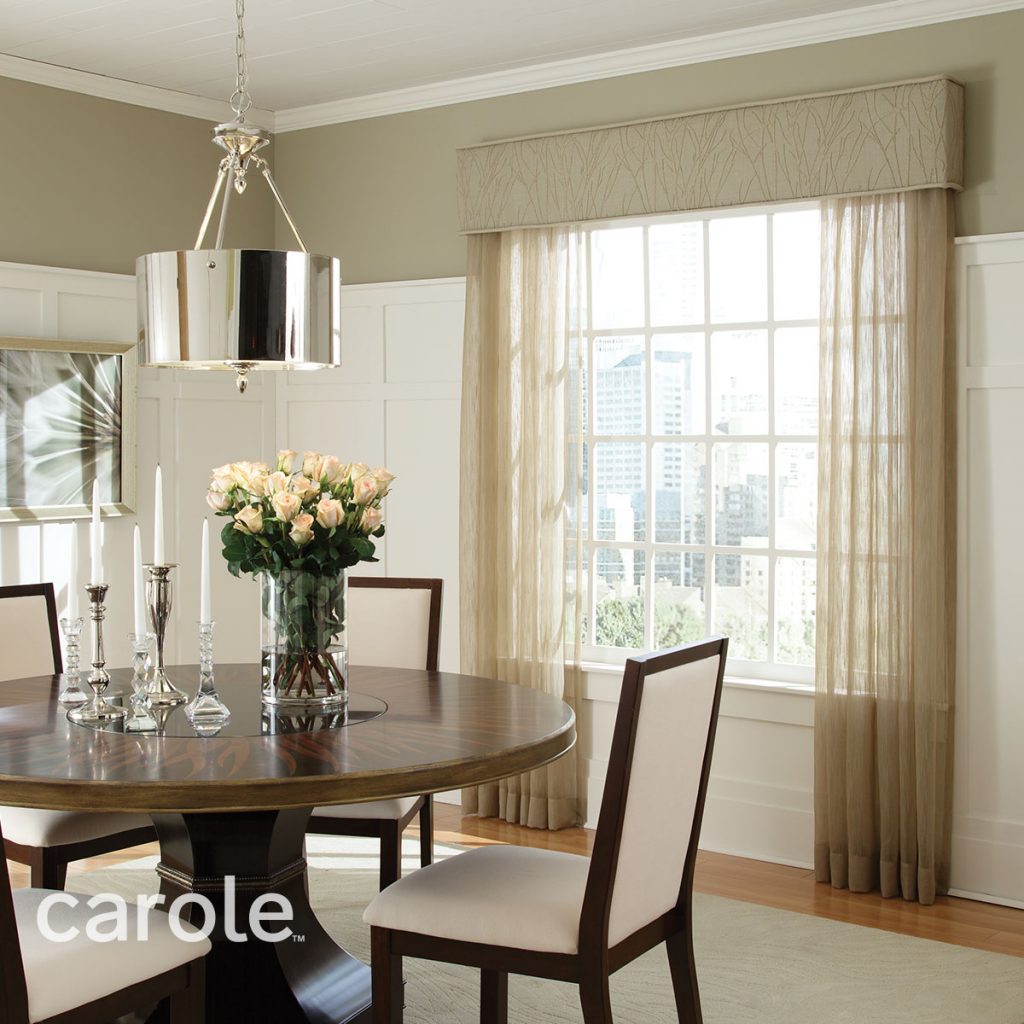 Tone-on-tone light beige Statler Cornice top treatment with beige sheer Drapery in a dining room.
