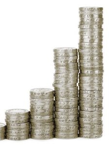 A line of progressively taller stacks of coins on a white background represent escalated costs in our industry.