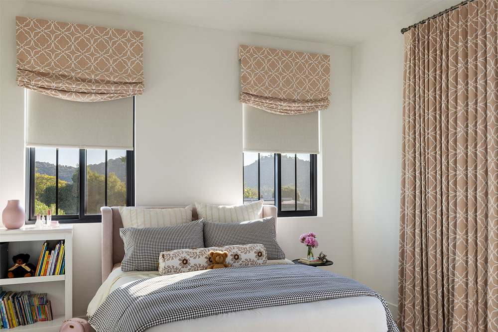 Pink Soft Faux Romans over windows in a girl's bedroom.