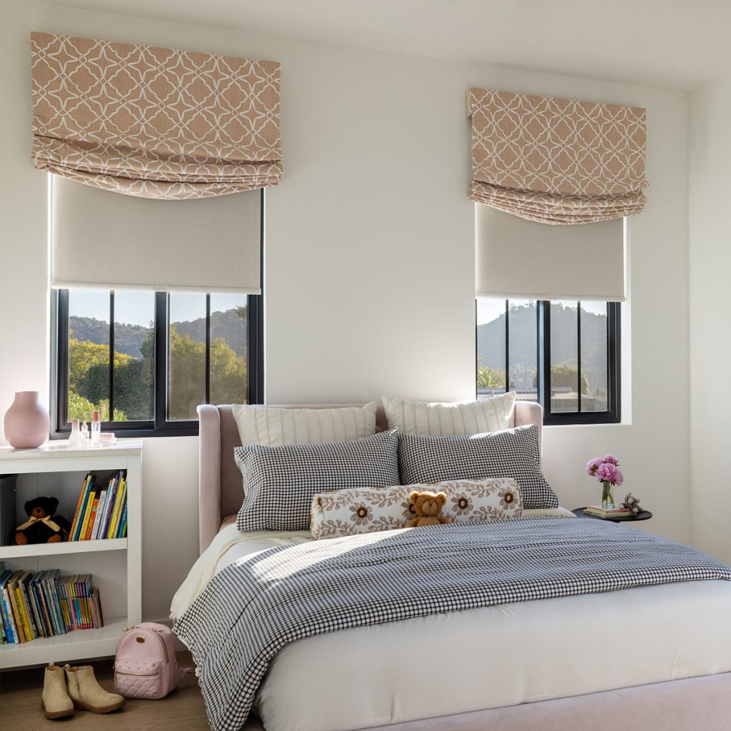 Pink Soft Faux Romans over windows in a girl's bedroom.