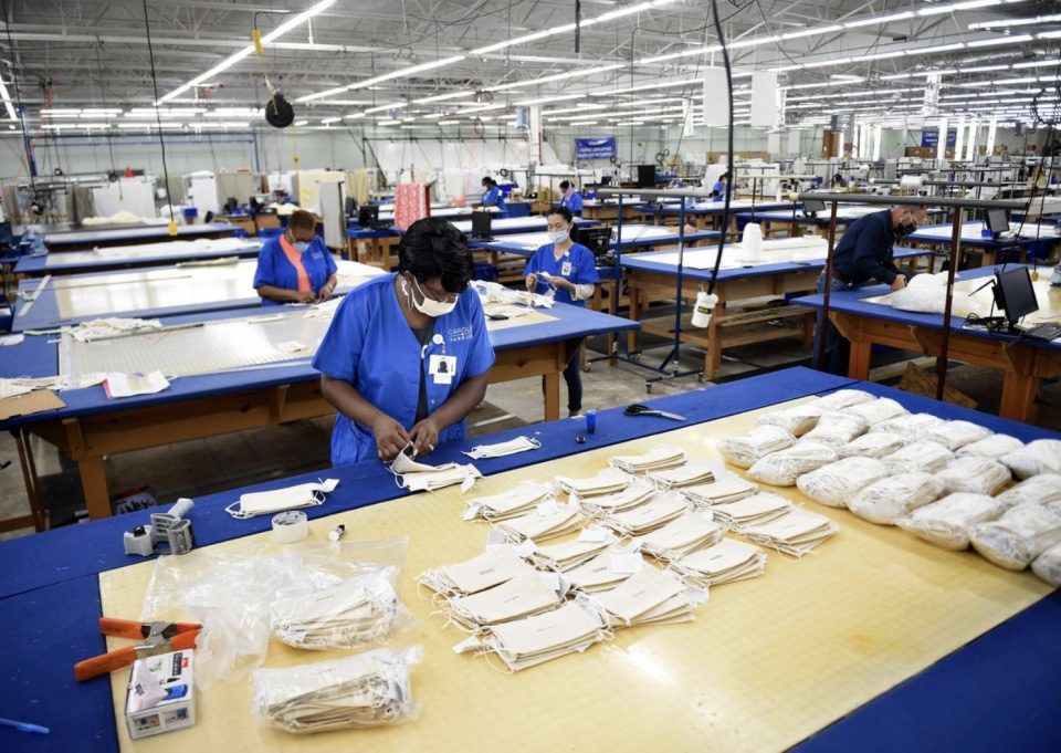 The workroom as employees from Carole Fabrics make face masks in response to COVID-19.